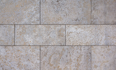 natural stone wall texture as background. Close-up of a wall clad in limestone