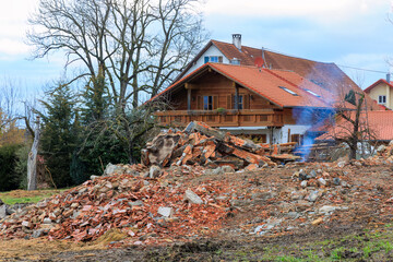 smoking ruin of an old demolished farmhouse In Gaishaus near Ravensburg in Baden Würtemberg on a...