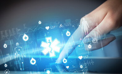 Naklejka na ściany i meble Close-up of a touchscreen with healthcare icons
