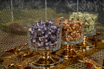 Almond candies.Colorful candies in glass bowl, almond sweets. Sugar Feast, (Feast of Ramadan) Ramadan concepts.