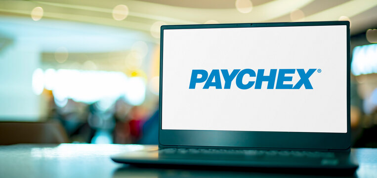 Laptop computer displaying logo of Paychex