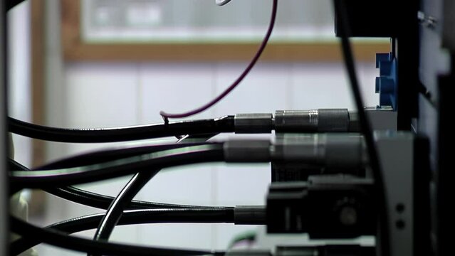 Technician Controlling Cables, Hands of a Man Working with Cables and Control Panel. Close Up.