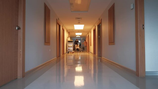 A child with his parents in the hospital after a kidney transplant