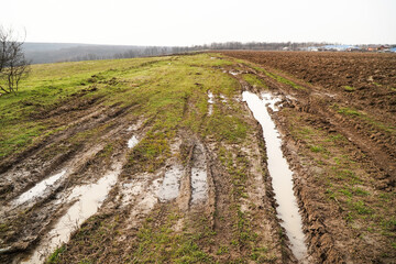 Fototapeta premium Dirt road. Rural. Country road. Unpassable. Damaged road