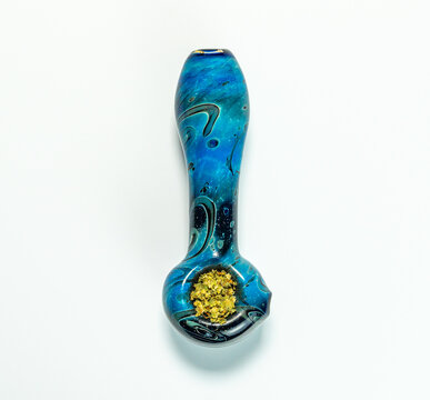 Glass marijuana pipe - blue green outer space bowl - overhead on white