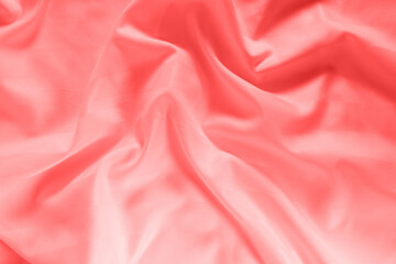 Abstract pink fabric background, satin stripe texture, wavy folds of elegant expensive fabric