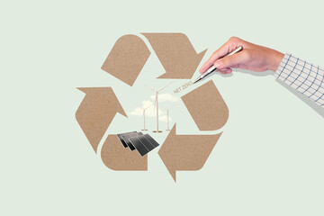 Male hand drawing recycling symbol for net zero carbon dioxide emissions. by balancing emissions of...