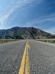 Vertical road view of the highway heading towards Kluane Lake in the Yukon
