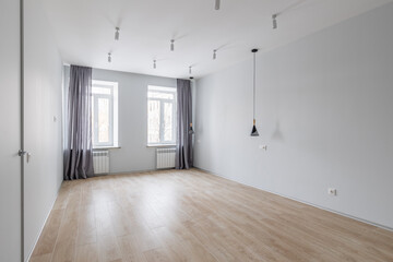 Empty gray room ready for people to move in