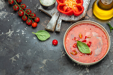 Spicy Homemade Gazpacho Soup. Summer cold vegan food on a dark background. Long banner format. top view