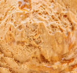 Caramel icecream detailed macro texture. Dark tofffee caramel   ice cream surface.