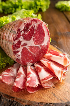Capocollo or coppa is a traditional Italian and Corsican pork cut made from cured pork shoulder or neck. . Cut into very thin slices. Italian delicacy for aperitivo. Piacentina DOP. 