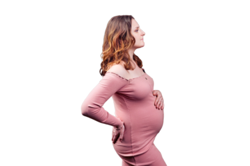 Portrait of an adult pregnant woman in profile, isolated on a white background. 35 year old woman with long curly hair in pink bodycon dress