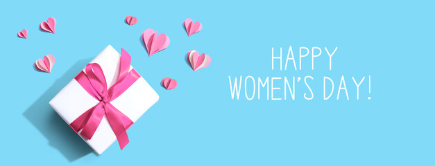 Fototapeta na wymiar Happy women's day message with a gift box and paper hearts