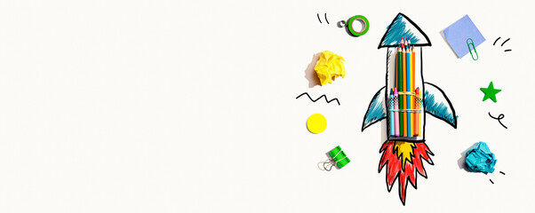 Back to school theme with a rocket with school supplies