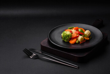 Delicious juicy broccoli vegetables, carrots, asparagus beans and bell peppers