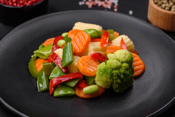 Delicious juicy broccoli vegetables, carrots, asparagus beans and bell peppers