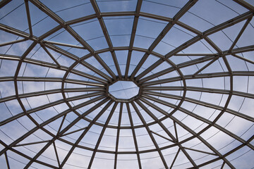 The roof is in the form of a dome with a spider web pattern