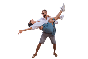 Happy caucasian couple in casual clothes sunglasses dancing against transparent background. Bearded young man lifting up girlfriend smiles. Travel, summertime leisure. Freedom concept, happiness.