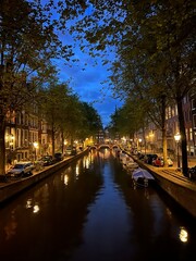 Canal In Amsterdam At Night
