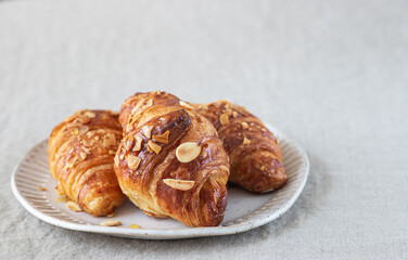 Almond croissant bakery homemade on the table.	