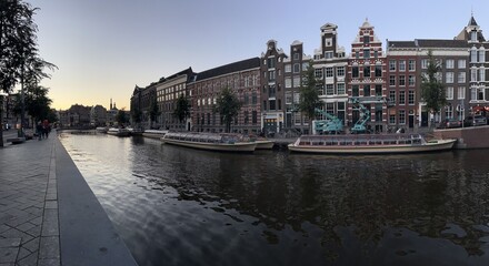 Fototapeta na wymiar Panorama Boat On The Canal In Amsterdam