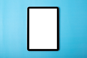The tablet on blue background