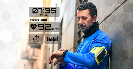 Man running in the park. Runner check heartbeat, steps and distance. Technology, health concept.