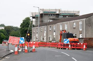 Traffic control signs and lights at road works