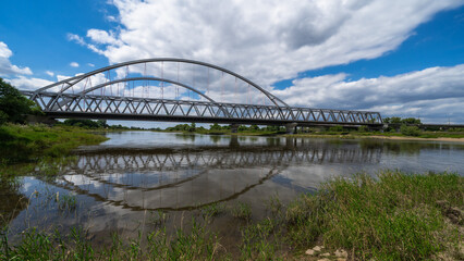 Reflection of two Elbe bridges in the river Elbe in Lutterstadt Wittenberg
