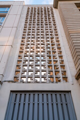 Obraz premium Old concrete wall fragment with geometric pattern