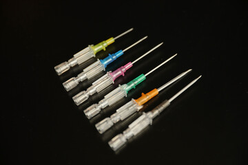 flu vaccine and needle syringes showing opioid crisis needle therapy and virus - obrazy, fototapety, plakaty