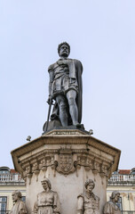 Fototapeta na wymiar Tall bronze statue of Luis de Camoes writer in Lisbon