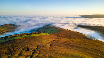 Aerial view of hills rising above a sea of cloud during a temperature inversion (Brecon Beacons)