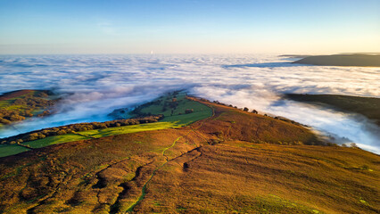 Aerial view of hills rising above a sea of cloud during a temperature inversion (Brecon Beacons)
