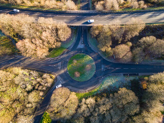Aerial view of a small traffic roundabout in winter