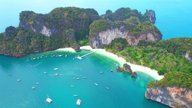 Tropical island paradise is a place of stunning natural beauty, pristine beaches, crystal-clear waters, lush vegetation, and a peaceful atmosphere. Hong Island, Krabi Province, Southern Thailand
