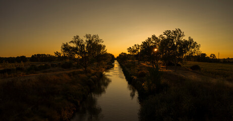 Sunset over Canal de Castilla in Spain