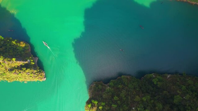 Embark on a breathtaking drone tour and explore the captivating beauty of nature. A natural wonderland awaits. Cheow Lan Lake, Khao Sok National Park in Surat Thani Province, Southern Thailand. HDR
