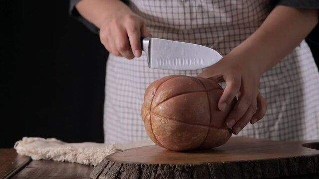 Mortadella. Traditional pork sausage with pistachios or black pepper. Italian delicacy from Bologna. High quality 4k footage