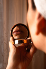 Fototapeta premium girl getting out of the shower in a vintage hotel room