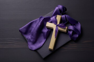 Top view flat lay of wooden cross crucifix with violet purple ribbon cloth with copy space. Holy week, lent season