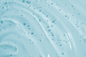 Clear gel serum texture. Liquid skincare cream background.
