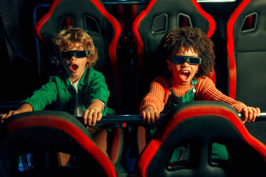 Kids having fun on a carnival Carousel