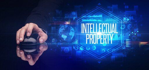 hand holding wireless peripheral, cyber security concept