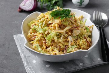 Salad with savoy cabbage, red onion and eggs, dressed with mayonnaise, Close up