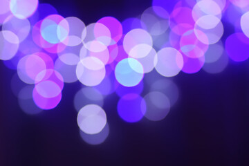 Abstract bokeh background. Blurred garland lights.