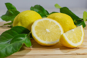 Fresh and healthy lemons on a wooden table