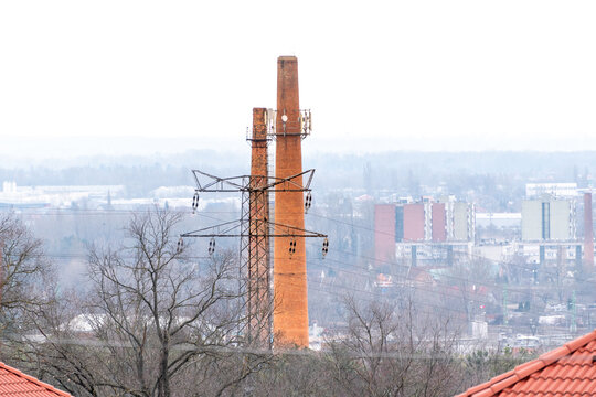 view of the buildings and chimneys of a large factory