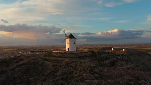 Windmills. These iconic towers over their skylines of la Mancha. 